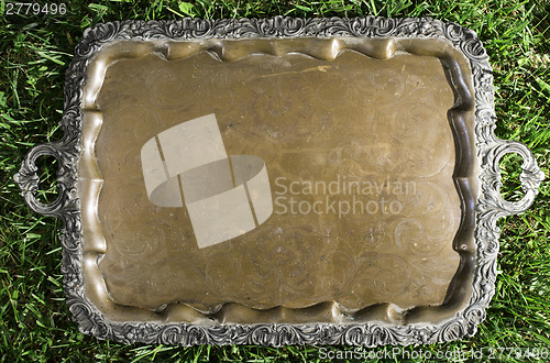 Image of Old vintage metal tray platter with ornament