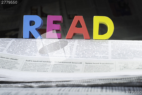 Image of Word read on newspaper