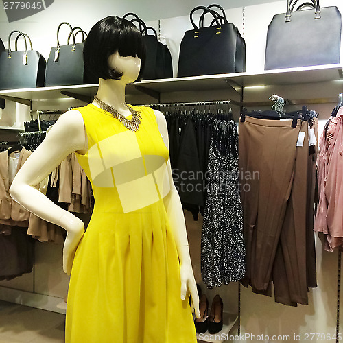 Image of Mannequin in yellow dress