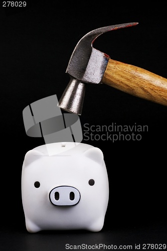 Image of Piggy Bank With Hammer