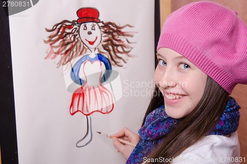 Image of Girl artist draws a funny girl