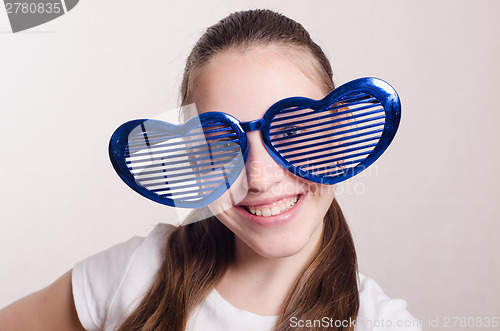 Image of Smiling girl in the big funny glasses