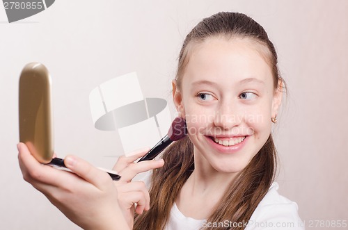 Image of Girl twelve years with pleasure face powders