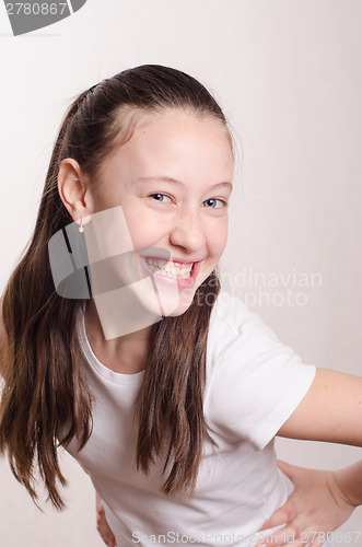 Image of Portrait cheerful girl of twelve