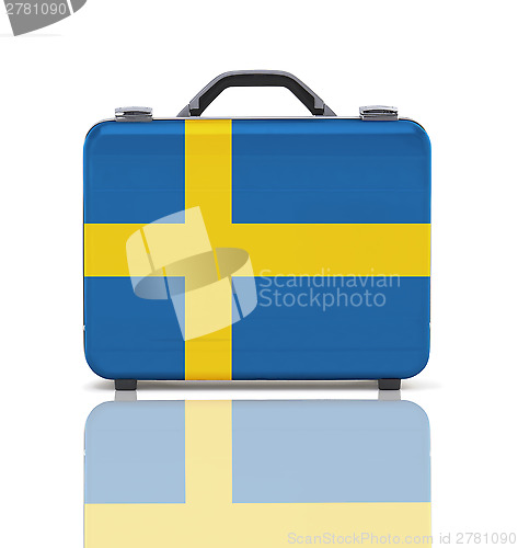 Image of Business suitcase for travel with reflection and flag of Sweden