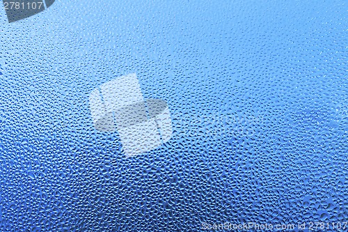 Image of Natural water drops on glass