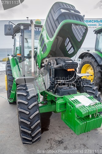 Image of Tractor with open cowl. Tyumen. Russia