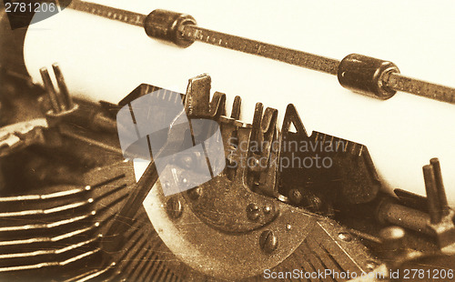 Image of Old typewriter with paper