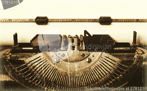 Image of Old typewriter with paper