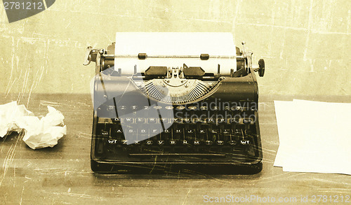 Image of Old typewriter with paper