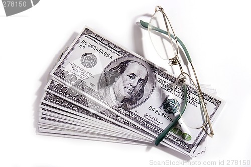 Image of Eyeglasses and Money