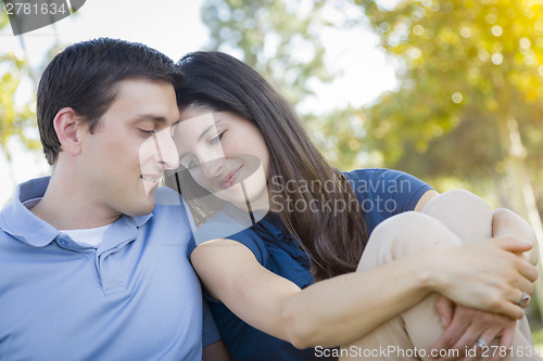 Image of Young Attractive Couple Portrait in Park