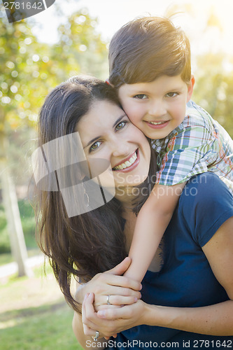 Image of Attractive Mixed Race Mother and Son Hug in Park