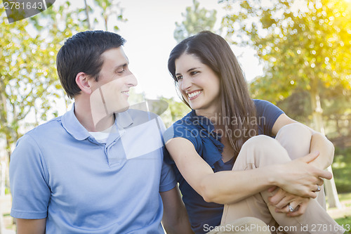 Image of Young Attractive Couple Portrait in Park