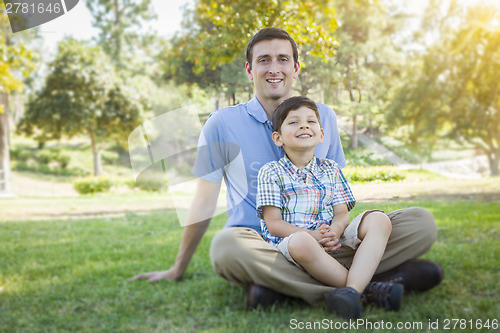 Image of Handsome Mixed Race Father and Son Park Portrait