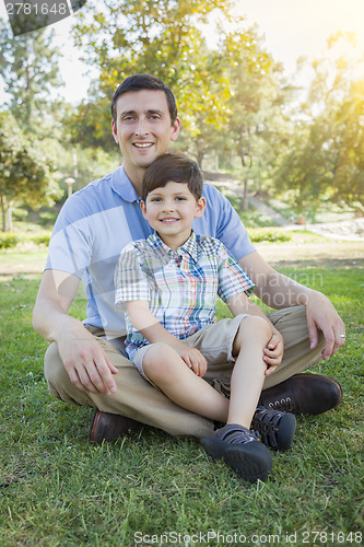 Image of Handsome Mixed Race Father and Son Park Portrait