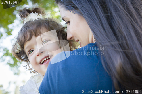 Image of Cute Laughing Baby Girl and Mother in Park