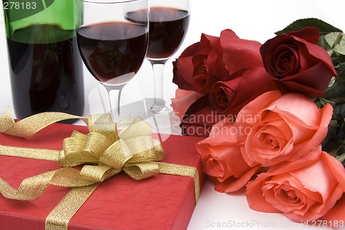 Image of Roses With Present And Wine