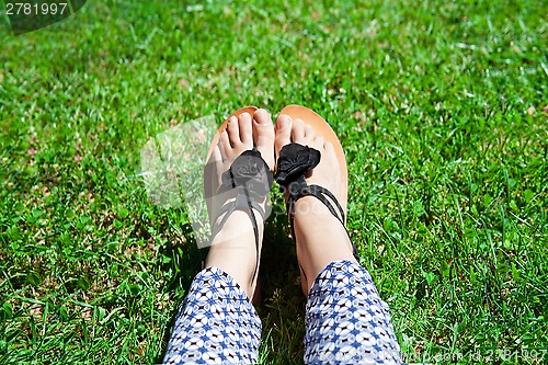 Image of feet in green grass 