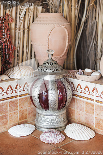 Image of Clay pot and lantern