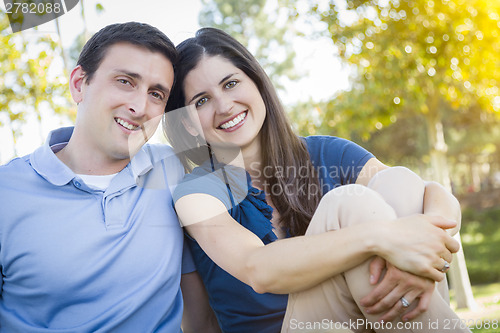Image of Young Attractive Couple Portrait in Park