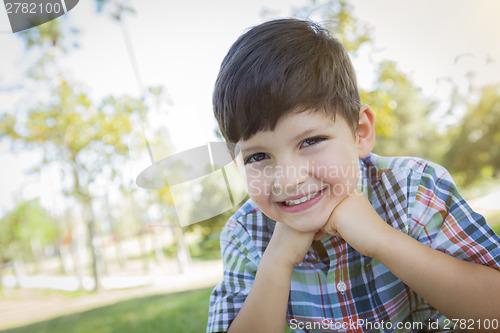 Image of Cute Young Boy Outdoors Portrait