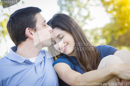 Image of Young Attractive Couple Portrait in Park