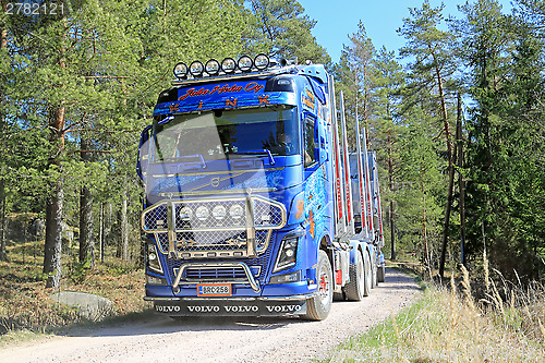 Image of Volvo FH16 750 Timber Truck on Rural Road