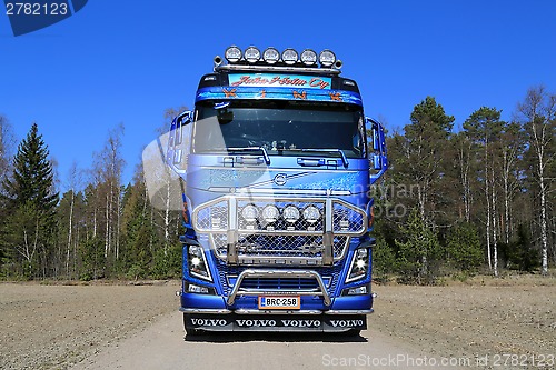 Image of Front view of Volvo FH16 Timber Truck on Country Road