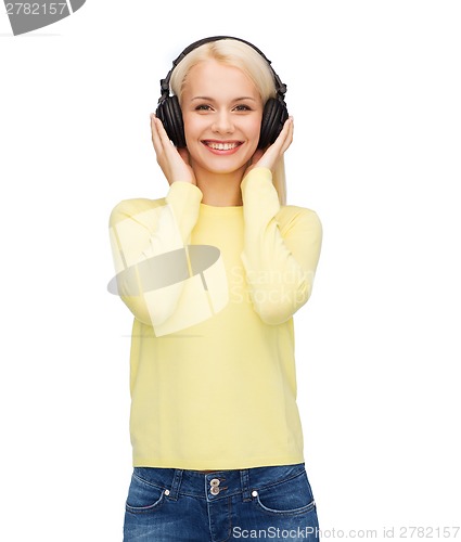 Image of smiling young woman with headphones
