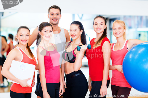 Image of group of smiling people in the gym