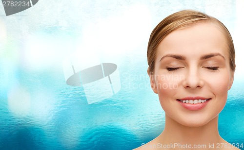 Image of face of beautiful woman with closed eyes