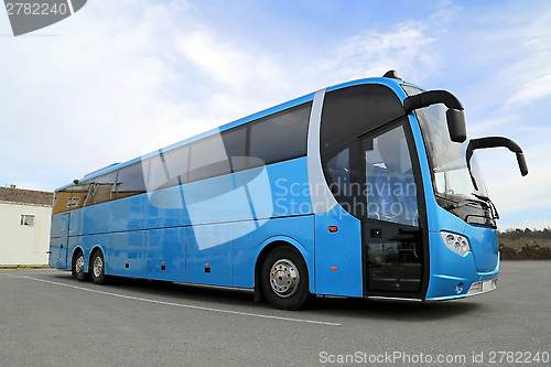 Image of Blue Bus on Parking Lot