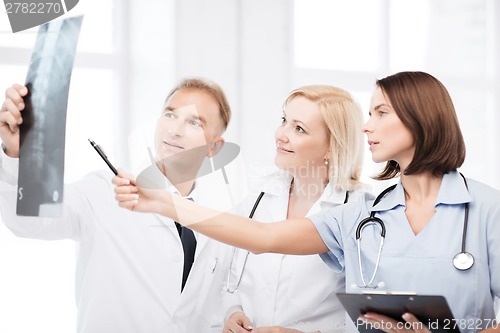 Image of doctors looking at x-ray