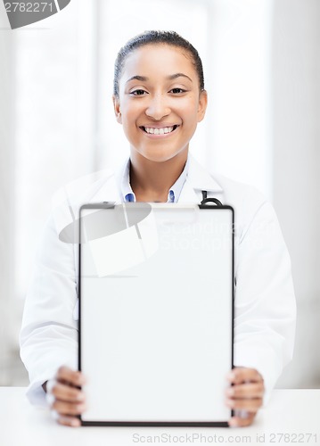 Image of doctor with blank prescription