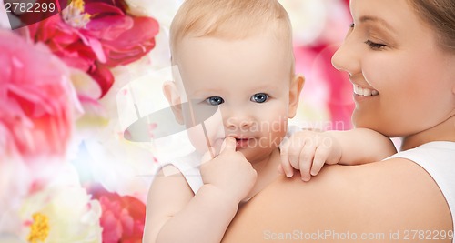 Image of happy mother with adorable baby