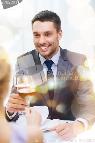 Image of young man looking at girlfriend or wife