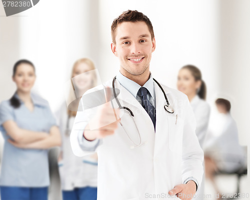 Image of doctor with stethoscope showing thumbs up