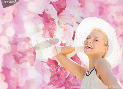 Image of beautiful woman enjoying summer outdoors