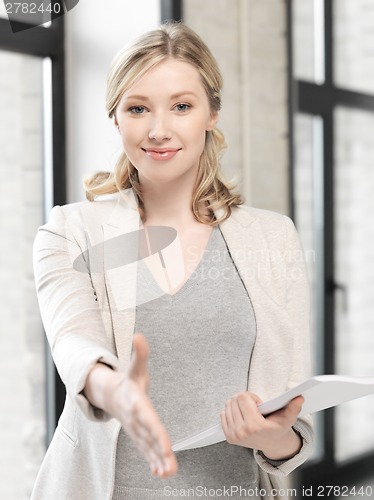 Image of woman with an open hand ready for handshake