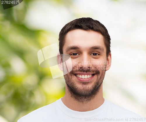 Image of portrait of smiling young handsome man