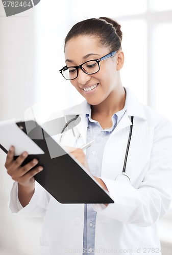 Image of african female doctor in hospital