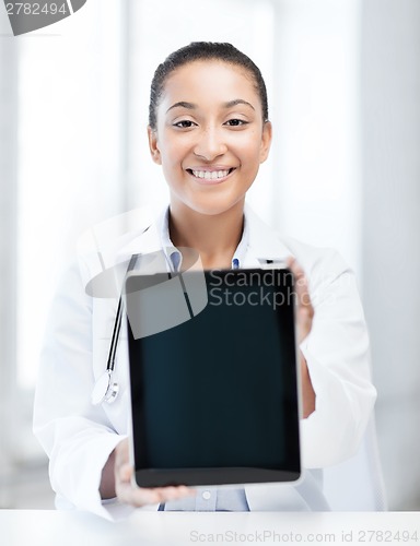 Image of african female doctor with tablet pc
