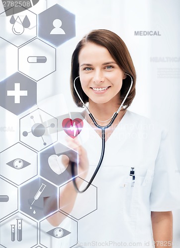 Image of female doctor with stethoscope and virtual screen
