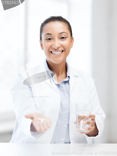 Image of doctor with offering pills