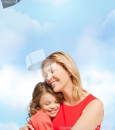 Image of hugging mother and daughter