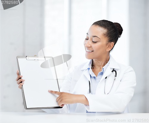 Image of doctor with blank prescription