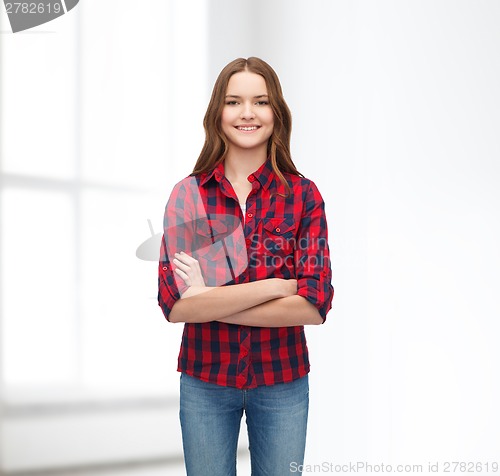 Image of smiling young woman in casual clothes