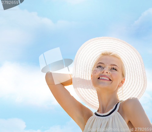 Image of beautiful woman enjoying summer outdoors