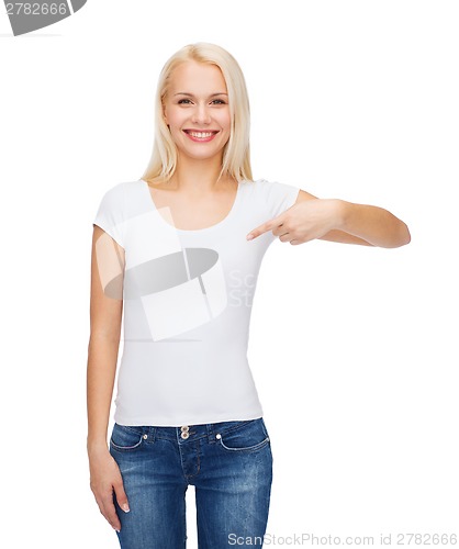 Image of smiling young woman in blank white t-shirt